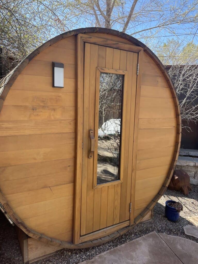 an exterior view of the wooden sauna at the Remedy Day Spa