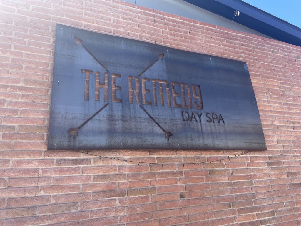 exterior sign that reads "The Remedy Day Spa"