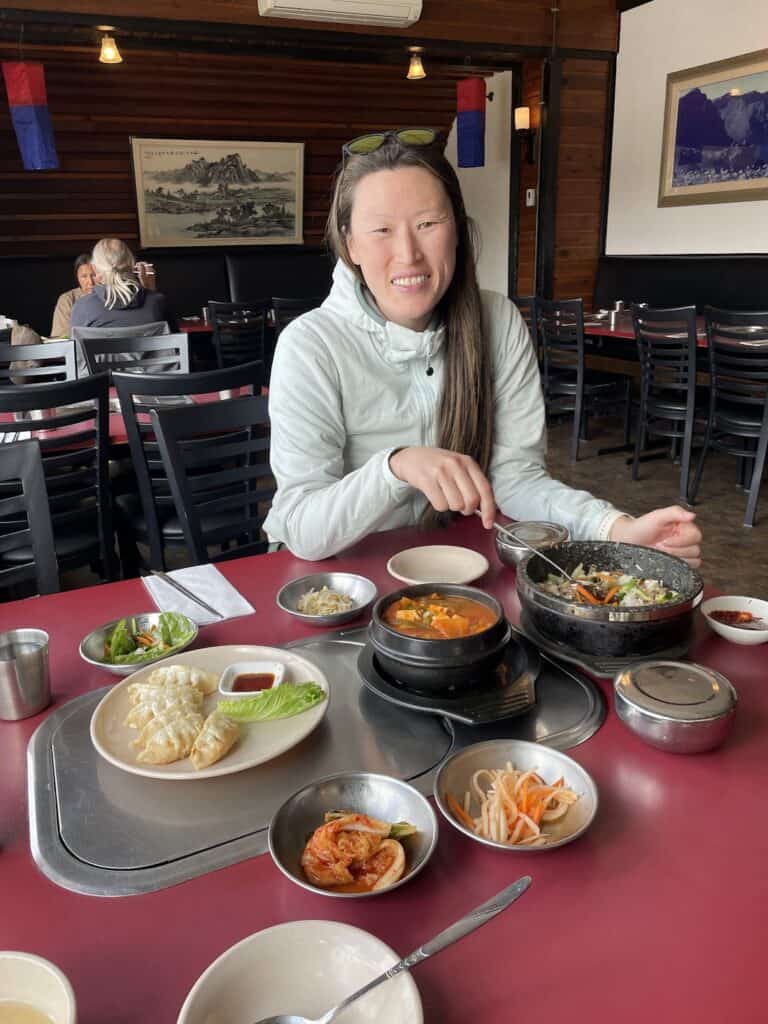 several dishes full of Korean food grace a table in the Seoul Country Korean Kitchen in Banff