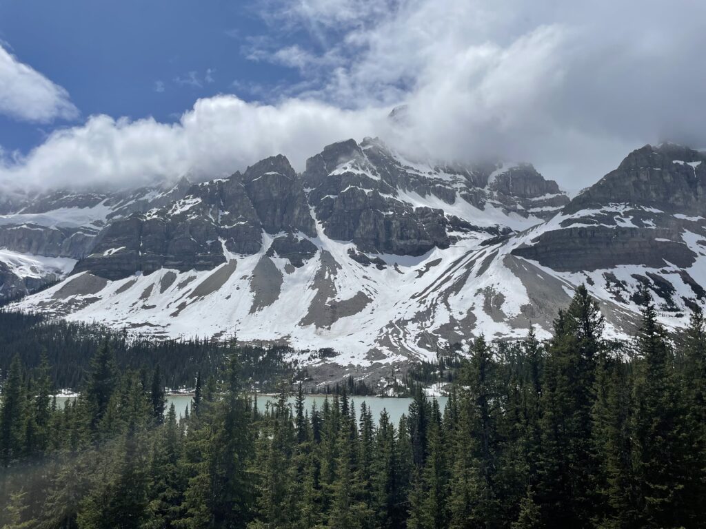 snow covered mountains over Bow Lake in Banff on a cloudy day 