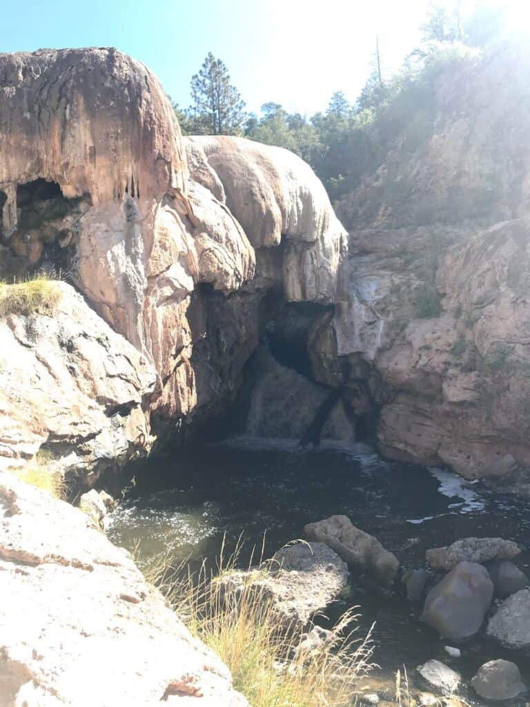 views of the rounded geological formation of Soda Dam in Jemez Springs