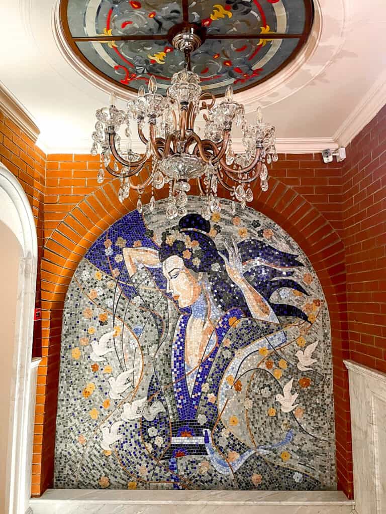 a beautiful mosaic of a woman surrounded by doves at the Chreli Abano bathhouse of Tbilisi