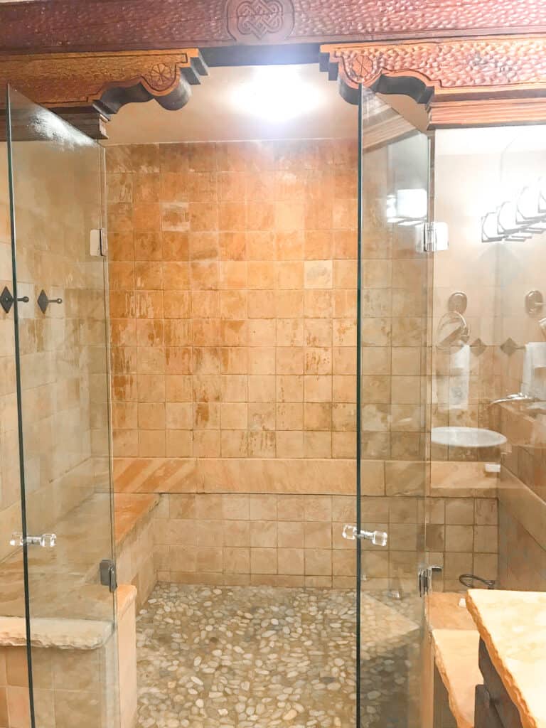 beautiful tiled shower with glass doors in Native American suites at El Monte Sagrado in Taos 