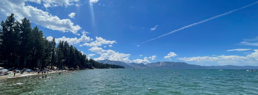 sparkling blue waters and a crystal blue sky over Lake Tahoe 
