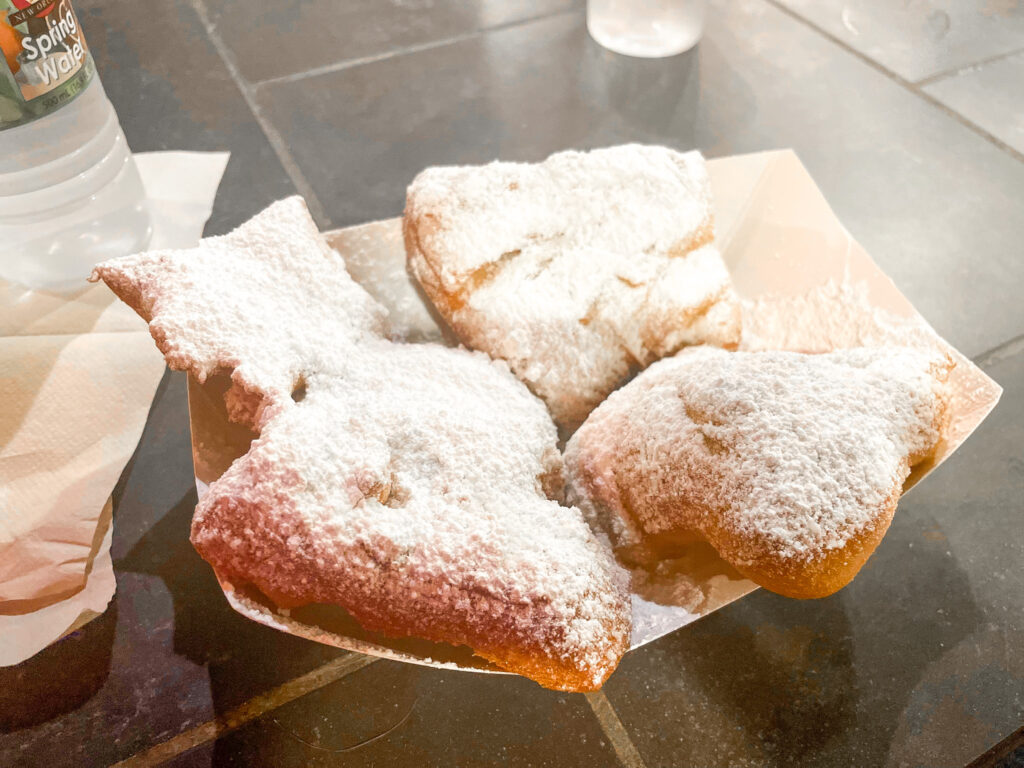beignets are an obvious addition to the must try food list of new orleans